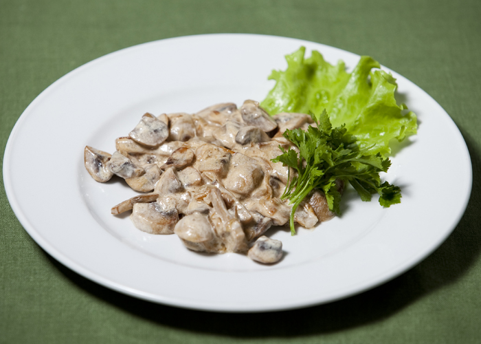 Gebratene Champignons in Sauerrahm